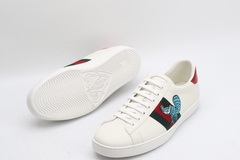 G*u*i sneakers