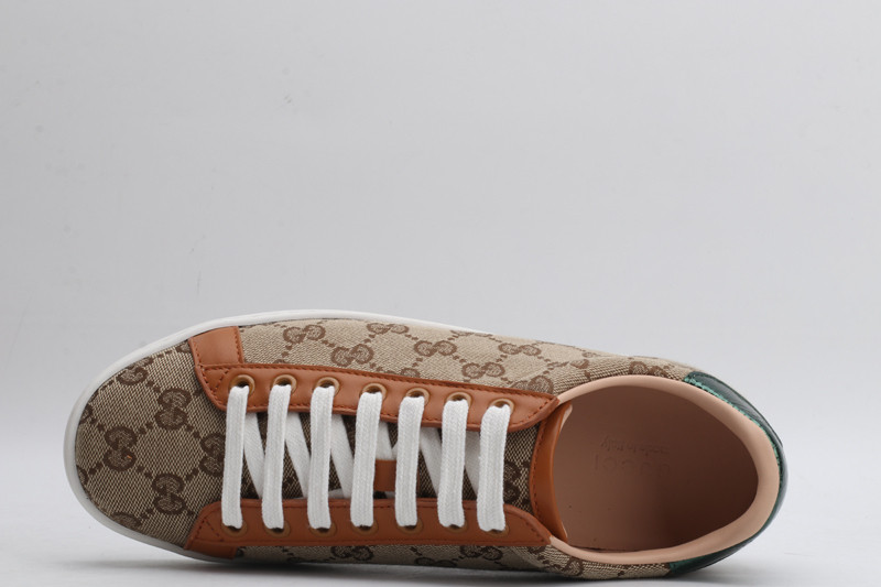G*u*i sneakers